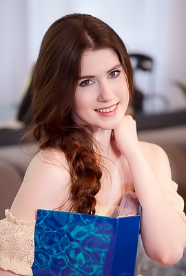 Pearl Spreads The Delicate Pink Folds Of Her Shaved Pussy