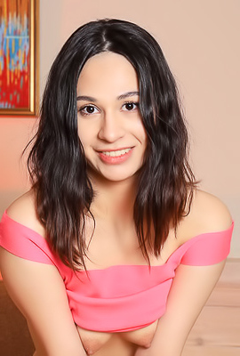 Nessa Raven-haired Sweetie Is Soon Naked On The Sofa