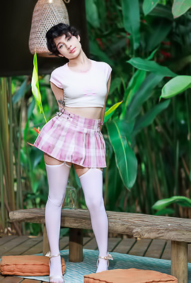 >Dakota Jhons Entices In White Top And Plaid Skirt Outdoors Posing Seductively With High Heels On