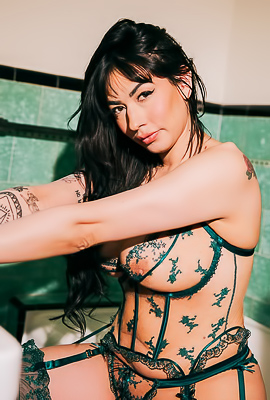 Sabina Magic Flirts With A Surrendering Gaze In The Mirror Of Who Knows What