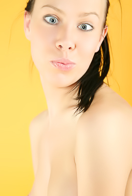 >Natalia B and Dahlia tease then go wild with wet fingers and naughty poses on yellow sheets