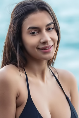 >Vanessa Alessia sprawls seductively on sun-drenched beach sand, legs spread wide